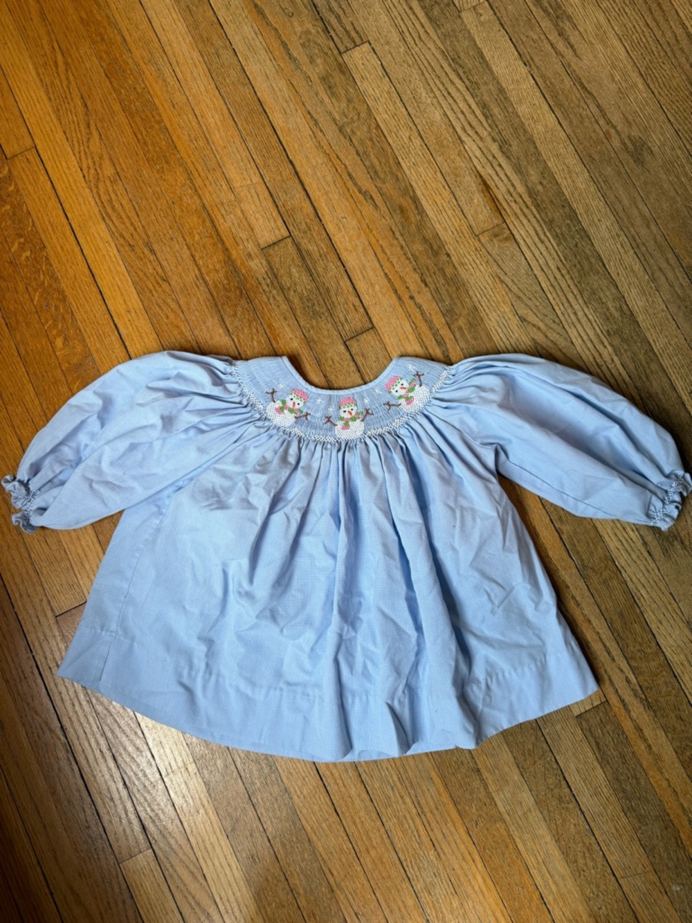 Girls' Light Blue Smocked Long-Sleeve Top with Snowman Motif